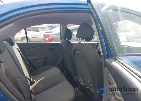 2009 Kia Rio Lx z USA, uszkodzony, nr VIN KNADE223296515210